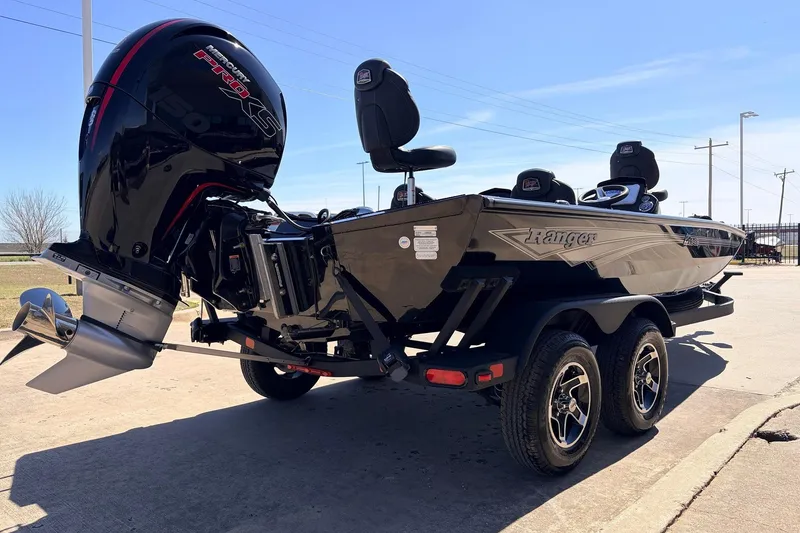 Slide: The Image of 2026 Ranger RT198P boat with powerful outboard motor on a trailer. - 7