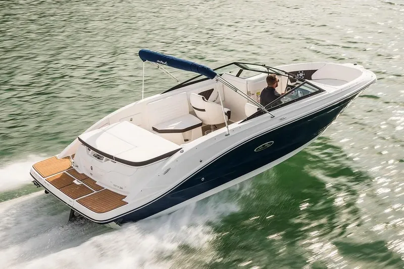 Slide: The Image of Manufacturer Provided Image: 2021 Sea Ray SPX 230 boat cruising on water. - 2