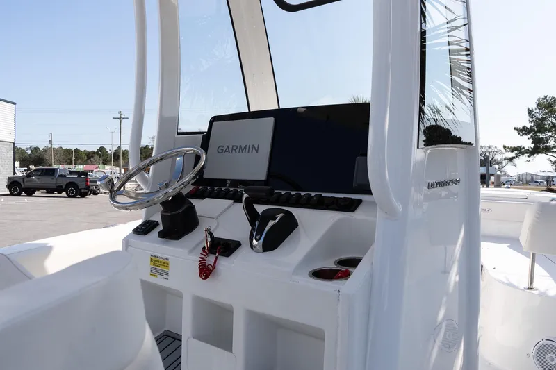 Slide: The Image of 2023 Sea Hunt Ultra 239 SE boat console with Garmin navigation system. - 15