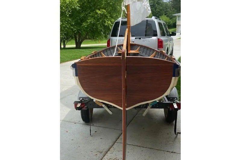 Slide: The Image of Home-built 2019 Cat's Paw boat on trailer, parked in driveway. - 11