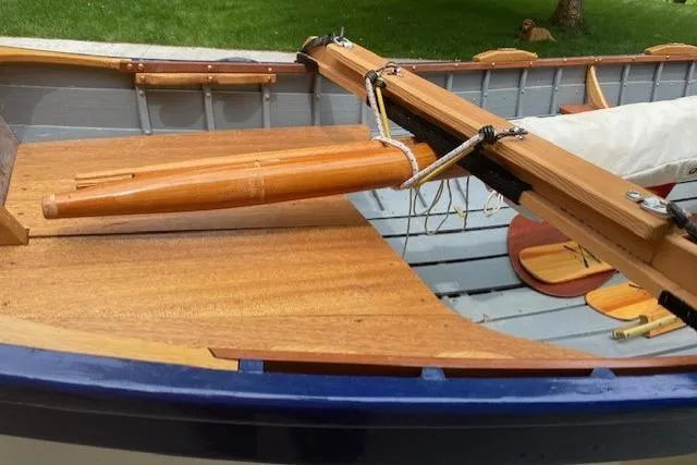 Slide: The Image of Wooden interior of 2019 HOME BUILT Cat's Paw boat with detailed craftsmanship. - 6