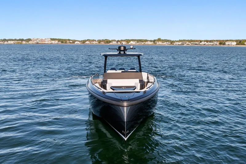 Slide: The Image of 2024 Vanquish Yachts 40 on open water, showcasing sleek design and luxury features. - 21