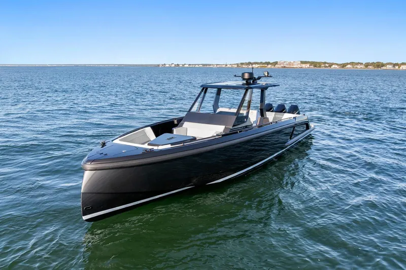 Slide: The Image of 2024 Vanquish Yachts 40 on open water, sleek design, modern luxury boat. - 22