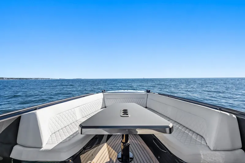 Slide: The Image of Luxurious 2024 Vanquish Yachts 40 with elegant seating and ocean view. - 33