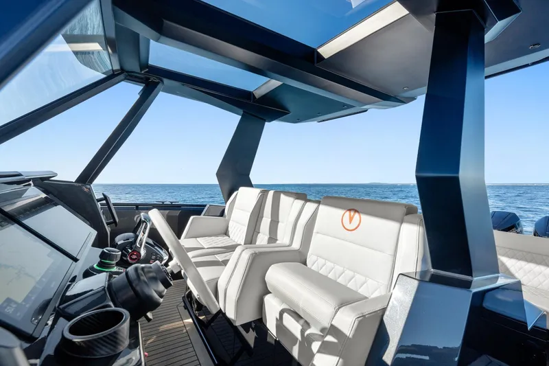 Slide: The Image of Interior of 2024 Vanquish Yachts 40, featuring luxurious seating and modern design. - 40