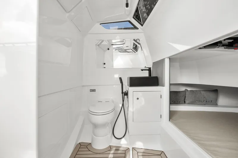Slide: The Image of Luxurious 2024 Vanquish Yachts 40 interior with modern bathroom and sleek design. - 45