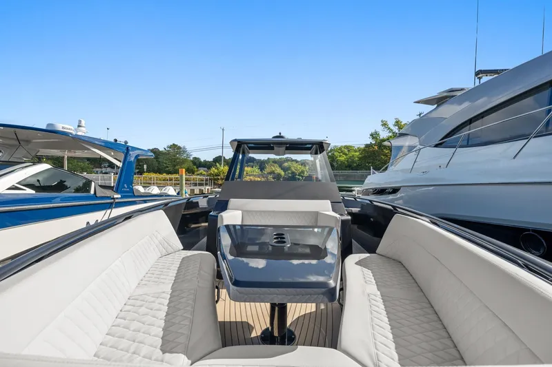 Slide: The Image of 2024 Vanquish Yachts 40 interior with luxurious seating and sleek design. - 49