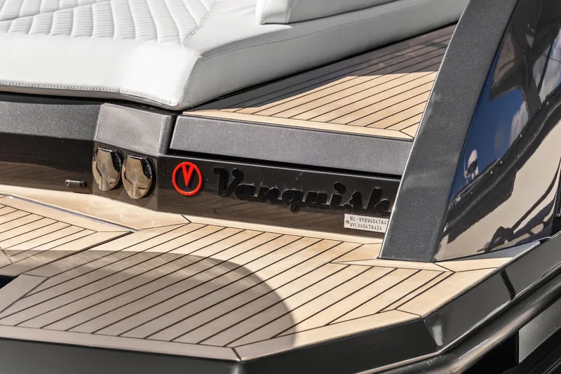 Slide: The Image of 2024 Vanquish Yachts 40, luxury yacht with sleek design and elegant wood decking. - 56
