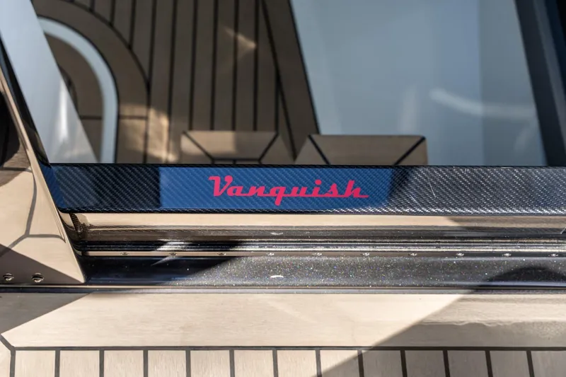 Slide: The Image of Vanquish Yachts 2024 model 40 logo on sleek yacht deck. - 60
