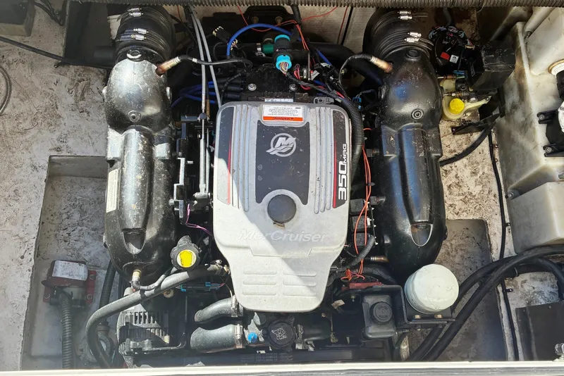Slide: The Image of 2011 Regal 2565 Express Cruiser engine compartment with MerCruiser 350 MAG engine. - 15
