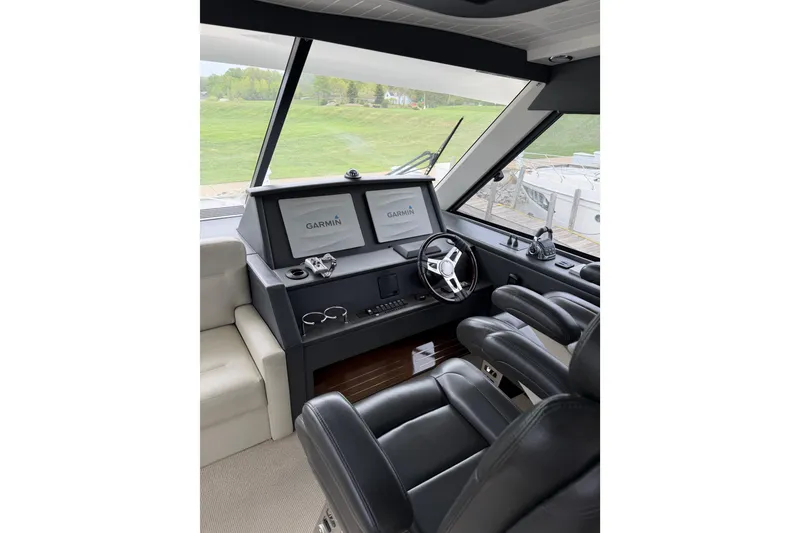 Slide: The Image of Interior helm of 2017 Maritimo M54 yacht with Garmin navigation displays. - 19