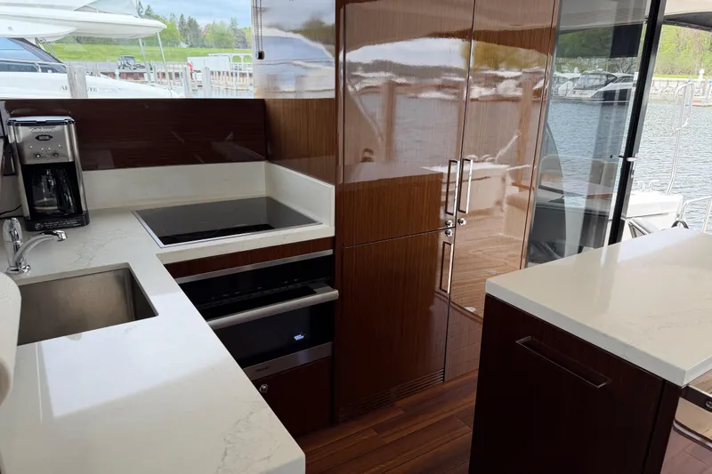 Slide: The Image of Luxurious kitchen interior of 2017 Maritimo M54 yacht with modern appliances and sleek design. - 6