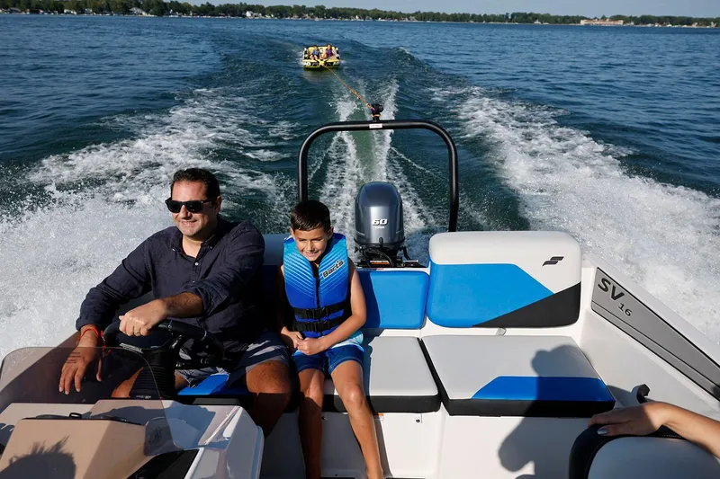 Slide: The Image of Manufacturer Provided Image: Family enjoying a ride on 2026 Starcraft SV 16 OB boat. - 15