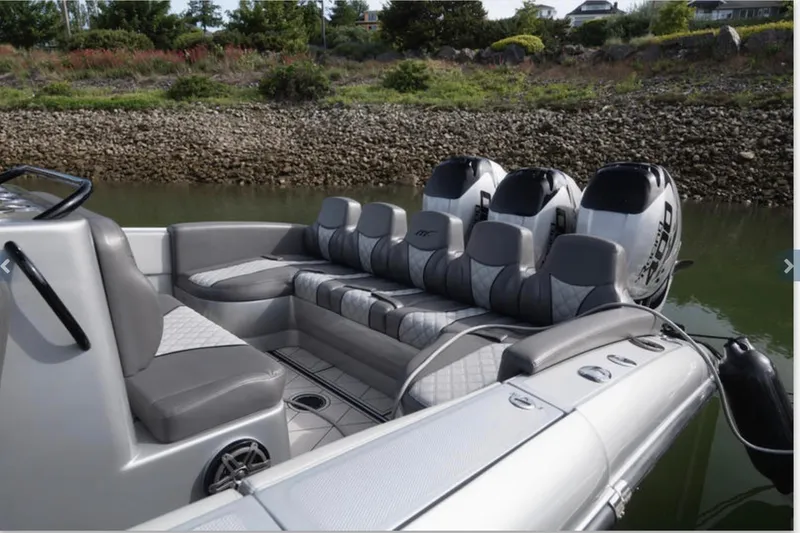 Slide: The Image of 2020 Midnight Express 37 Open boat with luxurious seating and powerful engines. - 6