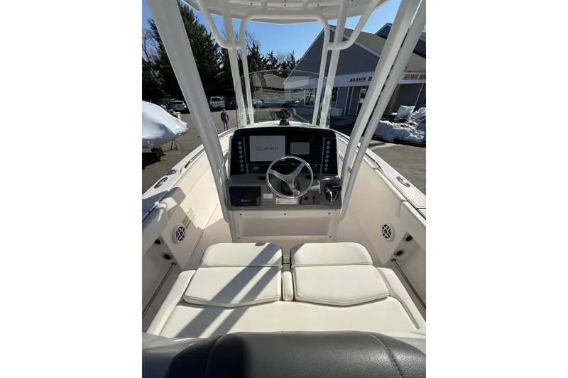 Slide: The Image of 2022 Robalo R230 Center Console boat interior with Garmin navigation system. - 25