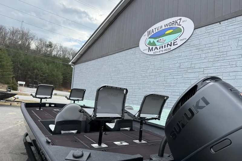 Slide: The Image of 2026 SeaArk Flex 21 Pro boat with Suzuki engine at Water Workz Marine. - 11