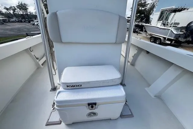 Slide: The Image of 2016 Parker 21SE Center Console boat interior with Igloo cooler and seating. - 8