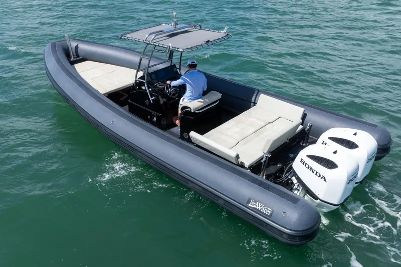 The Image of 2023 Sea Water PHANTOM 280 boat with dual Honda engines cruising on open water. - 0