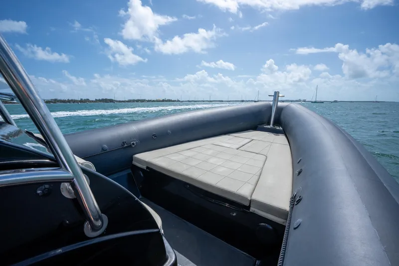 Slide: The Image of 2023 Sea Water PHANTOM 280 boat cruising on a sunny day with clear skies. - 13