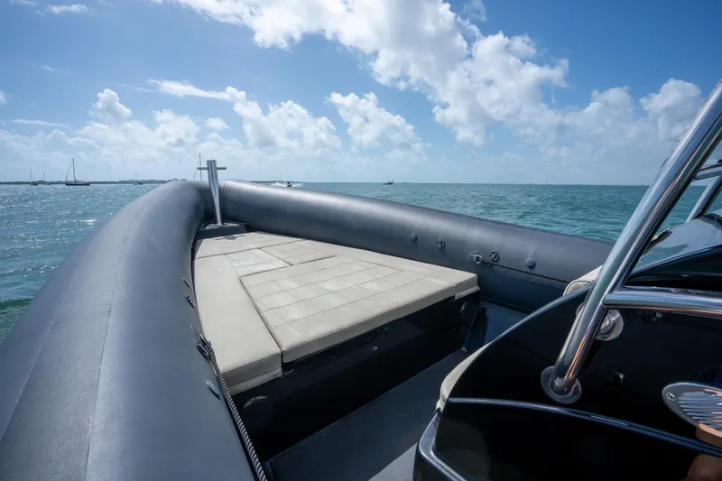 Slide: The Image of 2023 Sea Water PHANTOM 280 boat on open sea under blue sky. - 14