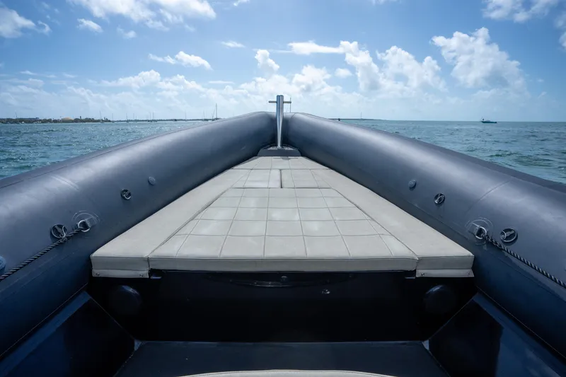 Slide: The Image of 2023 Sea Water PHANTOM 280 boat on open sea under blue sky. - 15