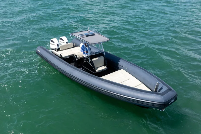 Slide: The Image of 2023 Sea Water PHANTOM 280 boat on open water, featuring dual Honda engines. - 19