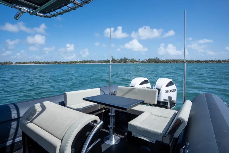 Slide: The Image of 2023 Sea Water PHANTOM 280 boat with Honda engines on a sunny day. - 23