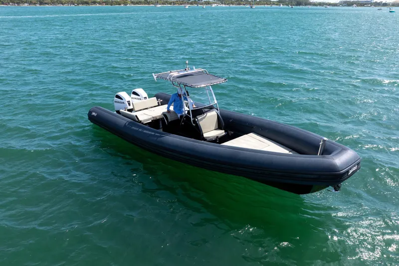 Slide: The Image of 2023 Sea Water PHANTOM 280 boat on open water with dual Honda engines. - 4