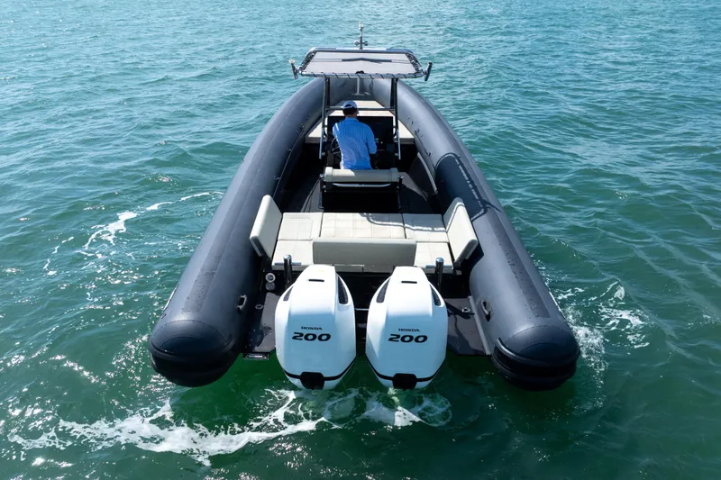 Slide: The Image of 2023 Sea Water PHANTOM 280 boat with dual Honda 200 engines on open water. - 8