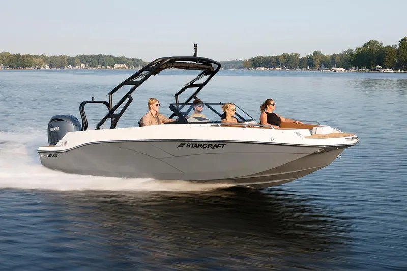 Slide: The Image of Manufacturer Provided Image: 2026 Starcraft SVX 210 DC OB boat cruising on a serene lake with passengers. - 25
