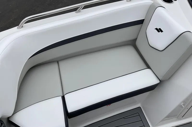 Slide: The Image of Interior of 2026 Starcraft SVX 210 DC OB boat with stylish seating and LED lighting. - 4