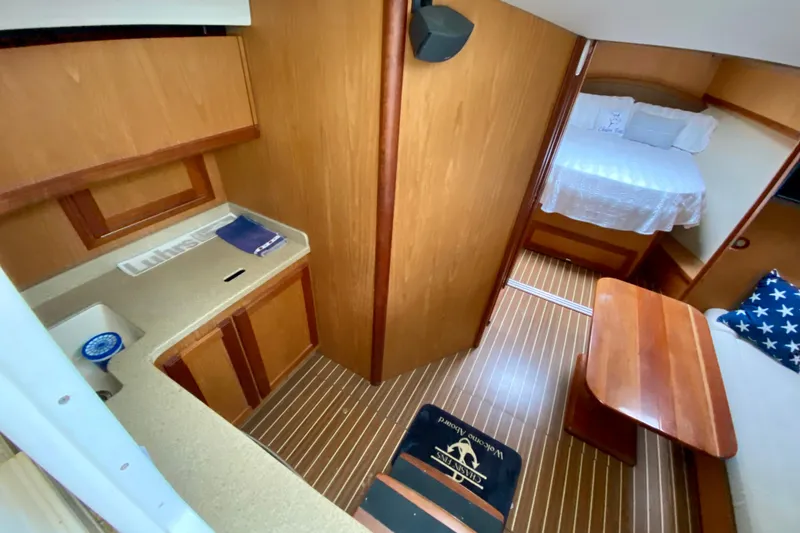 Slide: The Image of 2006 Luhrs 41 Open boat interior with steps and seating area. - 10