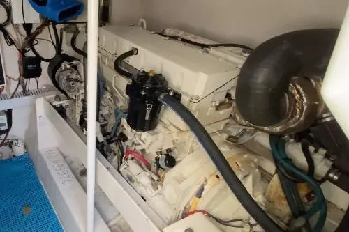 Slide: The Image of 2006 Luhrs 41 Open boat interior with cushioned seating and storage compartments. - 11