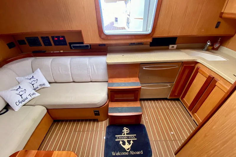 Slide: The Image of Interior of 2006 Luhrs 41 Open yacht with cozy seating and modern kitchen amenities. - 21
