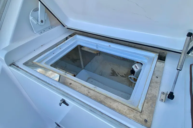 Slide: The Image of Open storage compartment on a 2006 Luhrs 41 Open boat, showcasing interior details. - 36
