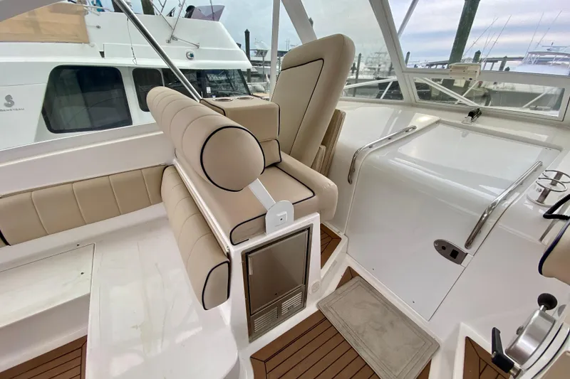 Slide: The Image of Helm of 2006 Luhrs 41 Open yacht with modern controls and panoramic view. - 5