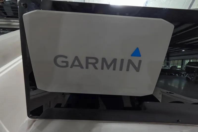 Slide: The Image of Garmin device on 2022 Tidewater boat, indoor setting, close-up view. - 10
