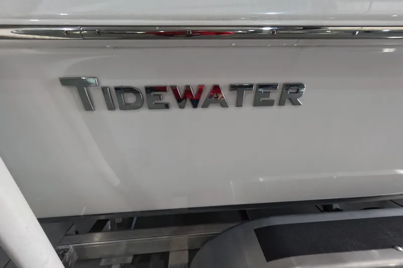 Slide: The Image of 2022 Tidewater boat logo on white surface, showcasing sleek design. - 17