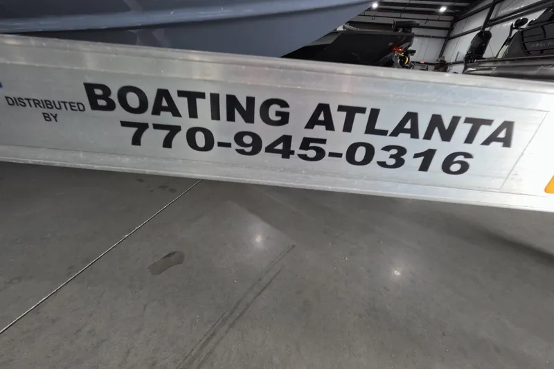 Slide: The Image of Boat trailer with "Boating Atlanta" contact information, distributed by Tidewater, 2022 model. - 19