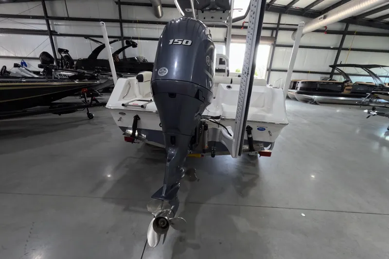 Slide: The Image of 2022 Tidewater boat with 150 HP outboard motor in showroom. - 3