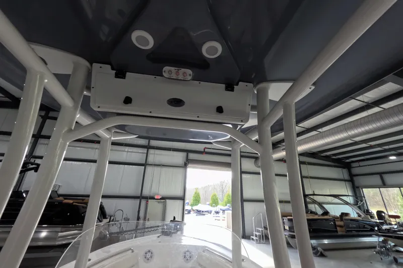 Slide: The Image of 2022 Tidewater boat interior view in a spacious showroom. - 8