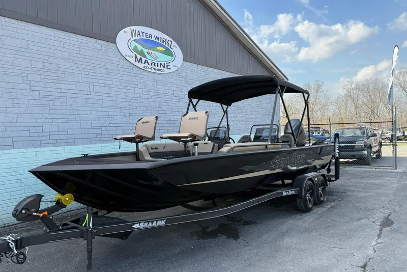 The Image of 2026 SeaArk Big Easy boat on trailer at Water Workz Marine dealership. - 0