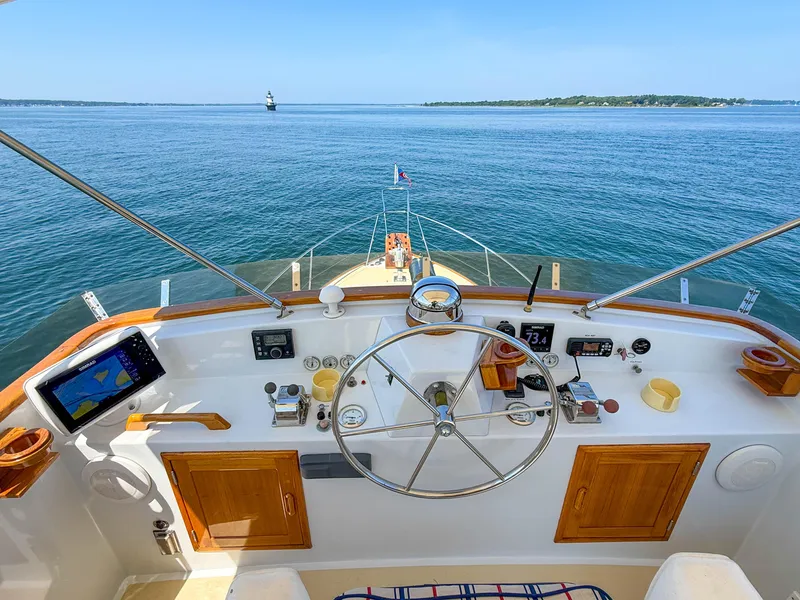 Slide: The Image of Helm of 1984 Wilbur 38 boat with ocean view and navigation equipment. - 9