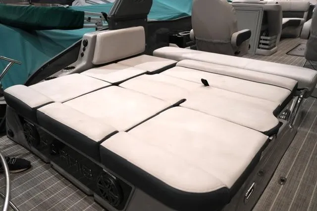 Slide: The Image of 2023 Harris Grand Mariner 250 SLDH boat interior with spacious seating and modern design. - 12