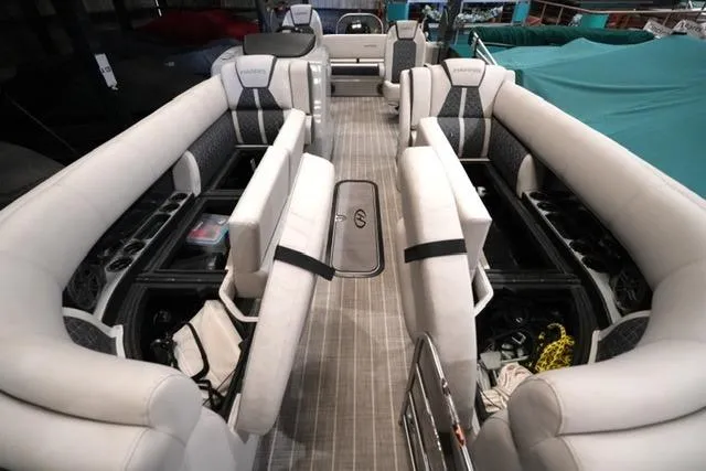 Slide: The Image of 2023 Harris Grand Mariner 250 SLDH pontoon boat interior with luxurious seating and modern design. - 4