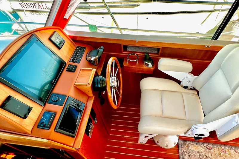 Slide: The Image of 2016 Sabre 38 Salon Express helm with modern controls and comfortable captain's chair. - 12