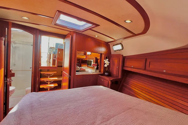 Slide: The Image of Luxurious interior of 2016 Sabre 38 Salon Express yacht with wood finish and skylight. - 19