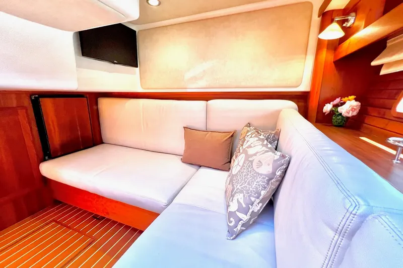 Slide: The Image of Luxurious interior of 2016 Sabre 38 Salon Express yacht with plush seating and elegant decor. - 22