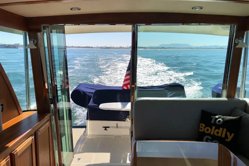 Slide: The Image of Interior view of 2016 Sabre 38 Salon Express yacht cruising on open water. - 32