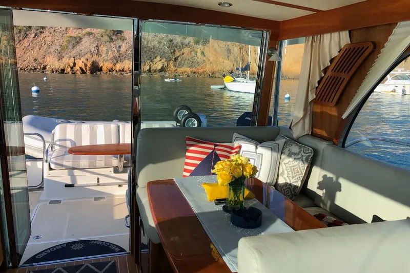 Slide: The Image of Interior of 2016 Sabre 38 Salon Express yacht with scenic ocean view. - 38